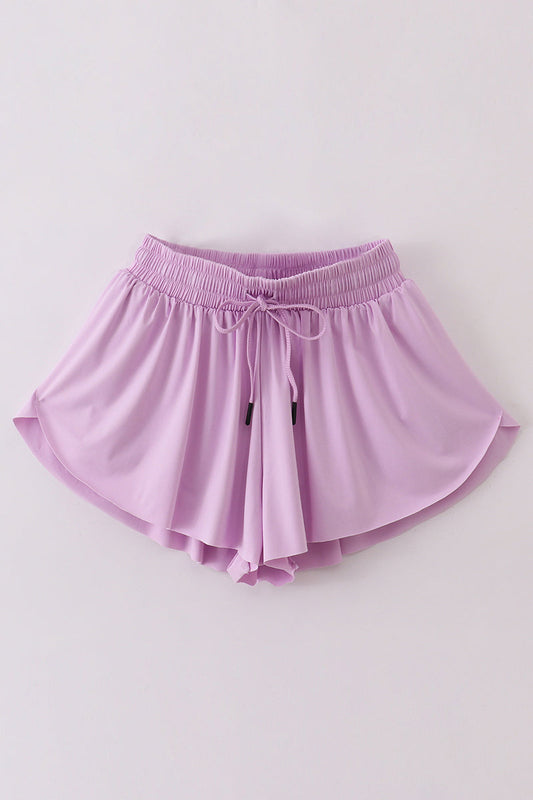 Purple woman sports shorts
